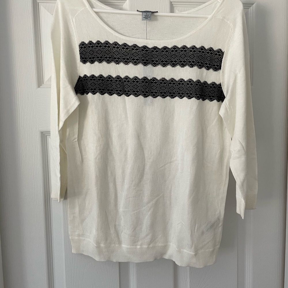 DKNY white top with lace detail.